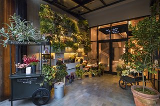 Guests enter the hotel through the Putnam & Putnam Flower Shop, meant to be a "botanical library" of sorts with planter boxes climbing a 15-foot wall. It’s the first retail space for owners Darroch and Michael Putnam, a couple whose clients include Gwyneth Paltrow and Bergdorf Goodman.