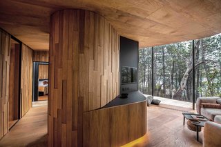 Offset planks of wood lend texture to interior walls.