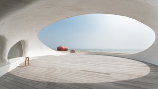 "The complex three-dimensional geometry of the Dune Art Museum’s concrete shell was shaped by hand by local workers in Qinhuangdao, using formwork made from small linear strips of wood and other materials," note the architects.