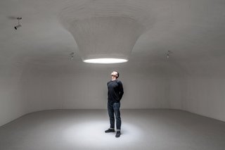 Skylights allow natural light to pour into the space. Intriguing openings invite guests to observe the ever-changing expressions of nature above.