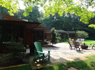 A look at the 1948 home before the remodel. Though the home had strong bones, its current owners sought to modernize the interiors while creating a close connection to nature.