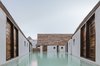 Modern home with Outdoor, Side Yard, Horizontal Fences, Wall, Vertical Fences, Wall, Large Pools, Tubs, Shower, Plunge Pools, Tubs, Shower, Swimming Pools, Tubs, Shower, Wood Fences, Wall, and Stone Fences, Wall. Each of Punta Caliza’s 12 rooms are connected to a private pool. Photo of Punta Caliza