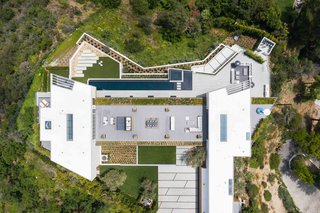 A look at the 20,000-square-foot residence from above. Here, you can see a clear view of the 2,000-square-foot rooftop terrace, as well as the 84-foot-long infinity pool.