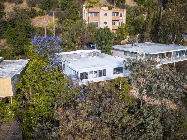 Part of what’s known colloquially as the Stilt Homes in Sherman Oaks, California, the home currently for sale at 3631 Oakfield Drive is enveloped by trees for added privacy.