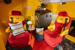 Two plush captain seats sit near the rear of the vehicle. A mini fridge comes stocked with Oscar Mayer hot dogs, condiments, and other essentials for a proper summer barbecue. 