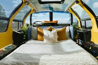 The retrofitted interior lets guests nestle inside the giant bun—like a hot dog—as they sleep.