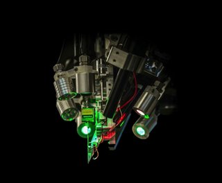 The neurosurgical robot has a needle that's 24 millionths of a meter in diameter, allowing for high-precision insertion of each delicate thread. 