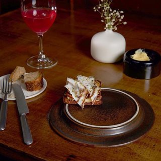 Nolla's prix fixe meals are locally sourced with a focus on seasonal ingredients. Optional beverage pairings include site-brewed beer, wines, and cocktails.