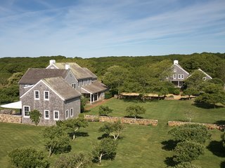 A similarly styled guest house was part of Jacobson's original design. The separate space offers another four bedrooms and three bathrooms, along with a living area and kitchen.