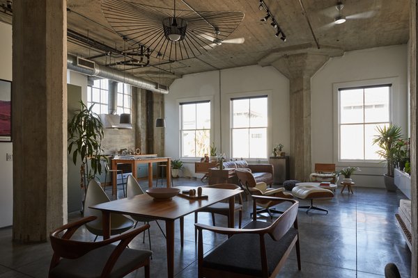 With high ceilings, Art Deco concrete pillars, and plenty of industrial details, this 1,462-square-foot corner loft is a striking private residence.