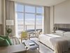 Guest rooms feature 11-foot-ceilings, private terraces, and Scandinavian-fumed oak plank floors. Creative director Anda Andrei worked with Bonetti/Kozerski Architecture on the interiors, bringing to life the vision of a hideaway in the sky. Photo 2 of Asbury Ocean Club Hotel modern home
