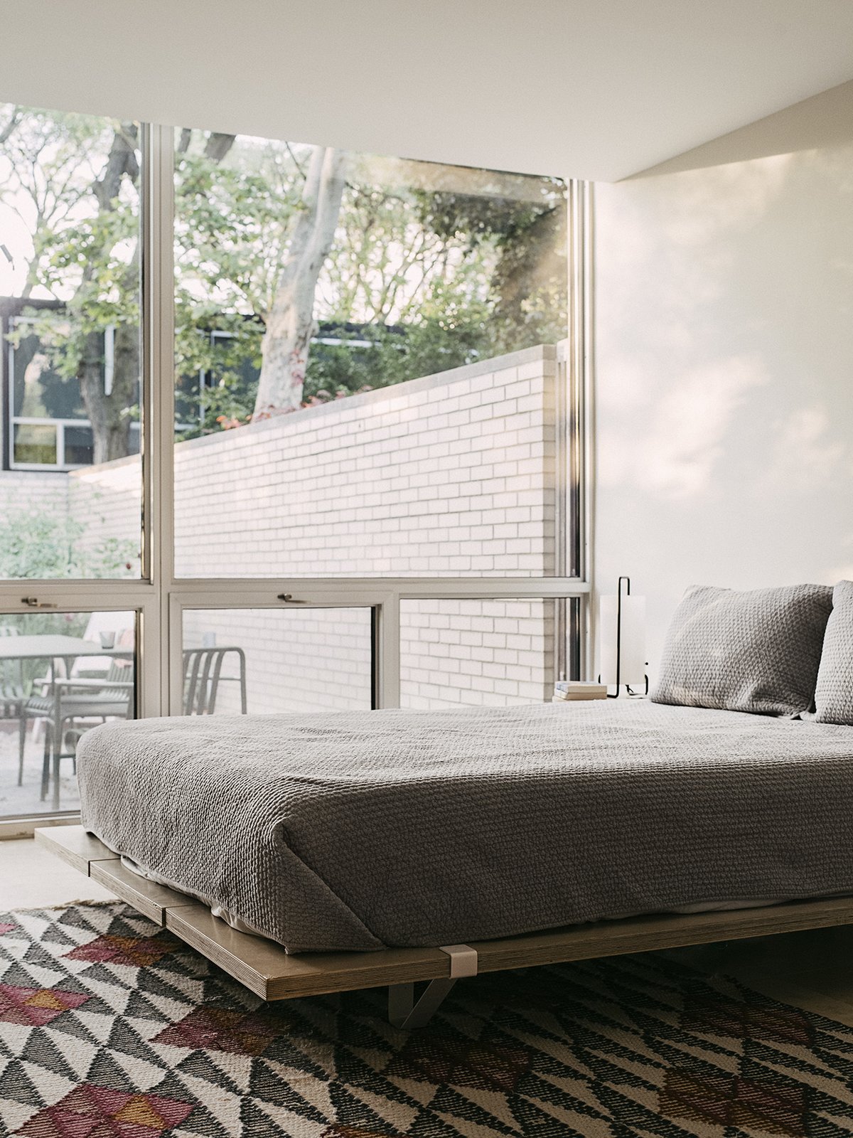 The bed is by Floyd (with headboard).