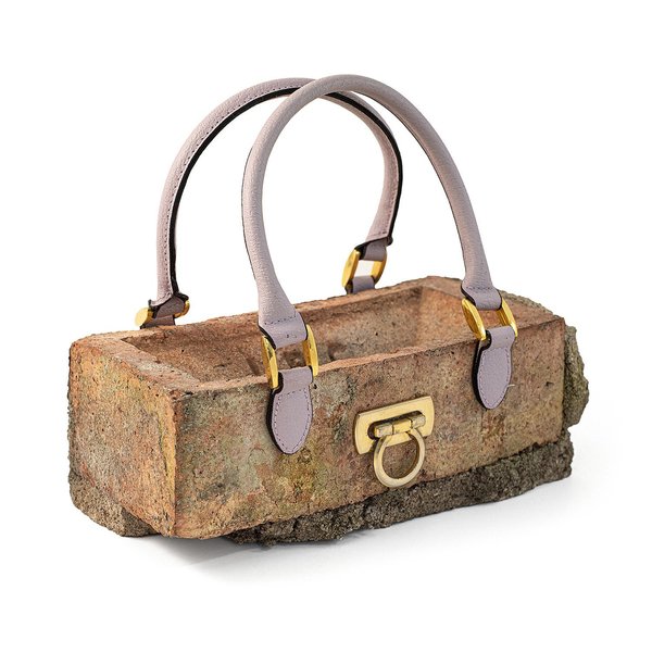 Banksy says the Banksy™ Clutch Bag is 