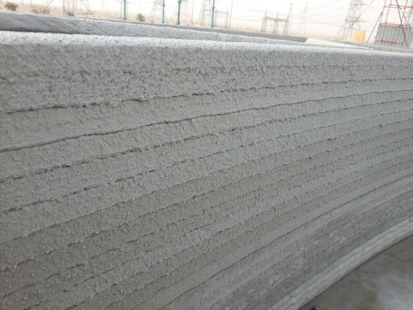 Custom software by Apis Cor guides the printer through the design layer by layer. 