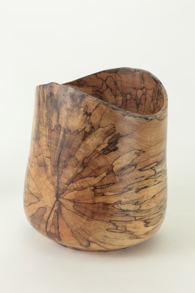 Mike Jarvi spun a section of the tree into seven bowls that he donated back to the Farnsworth House to keep or auction. A handful can be seen at the home&rsquo;s visitor center in Plano, Illinois.