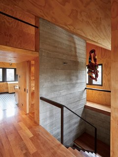 Stairs lead down to the semi-below grade bedrooms.