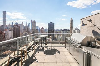 A stainless-steel outdoor kitchen awaits. 
