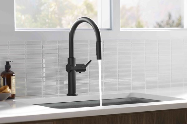 The Kohler Crue Collection. The mega company's brand introduced the Crue collection of sleek, gooseneck faucets that integrate motion sensors for hands-free operation. But the real story here is that the pull-down model is available with Kohler Konnect, the company's voice-activation app. No need to grab the measuring cup&mdash;like U by Moen, Crue can dispense precise amounts of water at desired temperature.