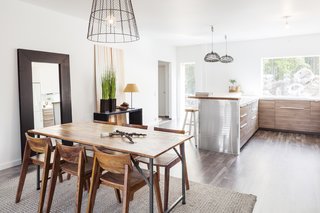 The entrance (at the back corner) leads directly into the kitchen, dining room, and living room. 