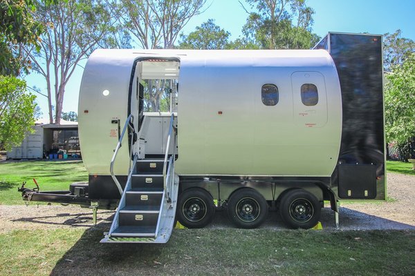 Aero Tiny is a converted Dash 8 airplane fuselage equipped with off-grid essential like solar power, water storage and pumps, a toilet, and a patio.