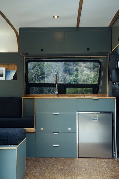 Cabinetry inside the Sprinter is sleek, hardy and functional, and a kitchenette with installed bench seating makes the "home is where you park it