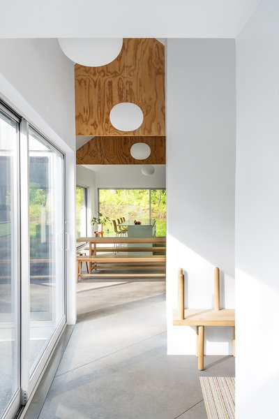 Three generations can gather around the picnic table in the dining area of the home.