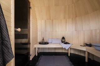 The two larger Iglusauna models come with a separate changing area.