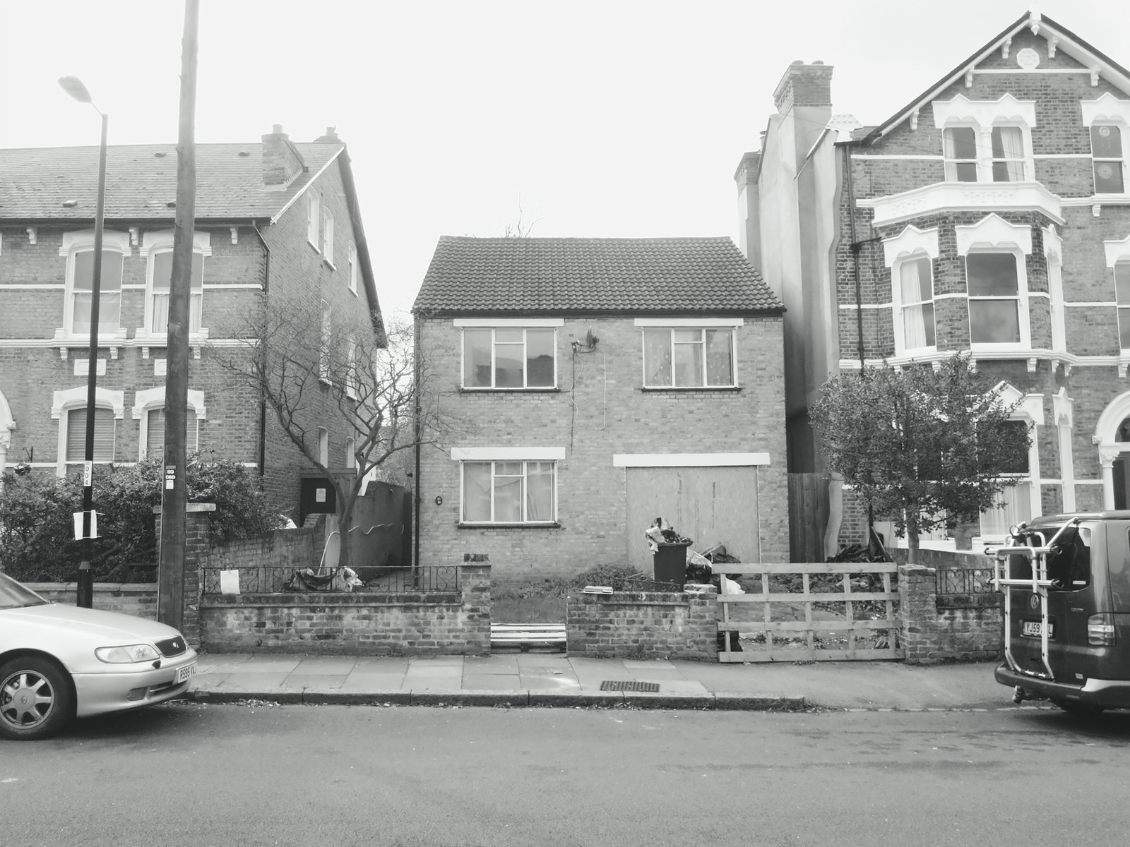 Photo 1 of 16 in A BareBones Brick Home in London Has Its Breakthrough