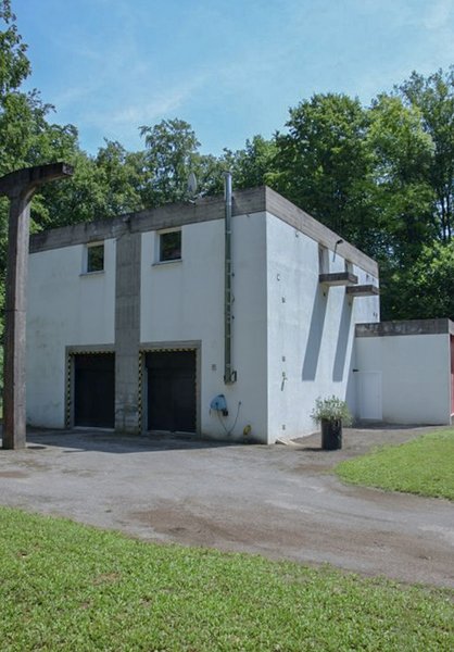 The current owner purchased the building in its original condition and transformed it into a split-level, single family residence. The renovated structure was recently classified as a French Historical Monument, along with the rest of the housing complex.