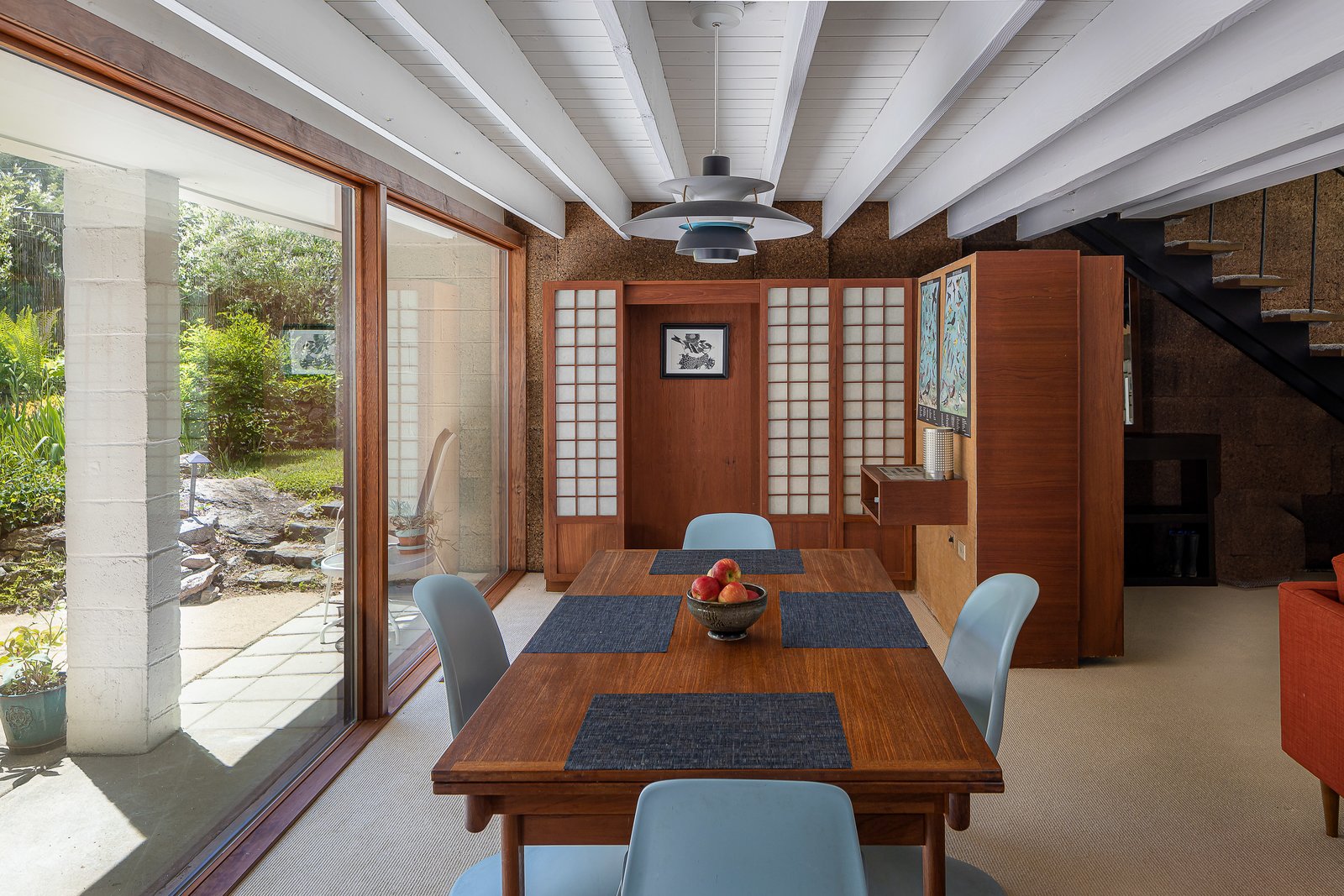 Tokonoma cabinets add a Japanese flair in the dining area.