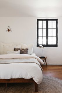 Another view of the bedroom. A similarly-sized space at the opposite end of the second floor is now used as a large walk-in closet but could be converted into an additional bedroom/office.