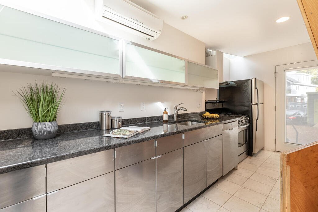 Photo 4 of 13 in In Cambridge, a Plywood-Clad Home With a Twist Asks ...