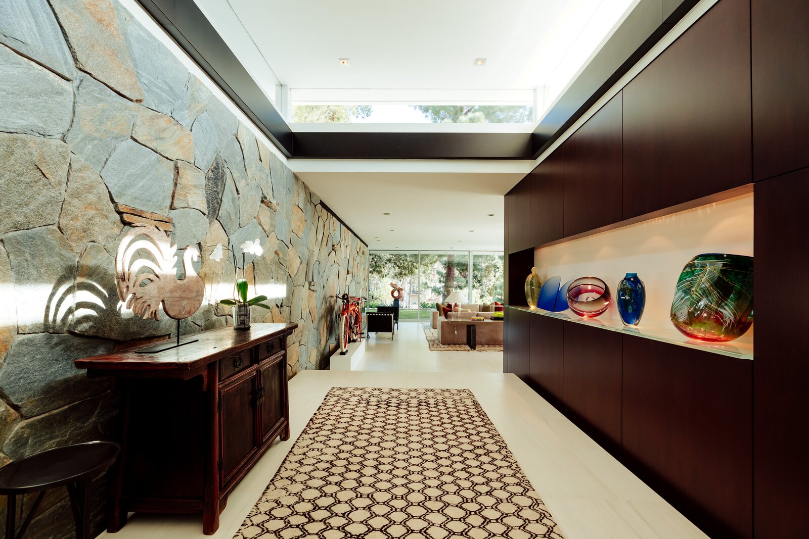 One of the home’s original exterior walls now serves as an interior wall. Skylights were added when the ceiling was raised in certain areas of the home.