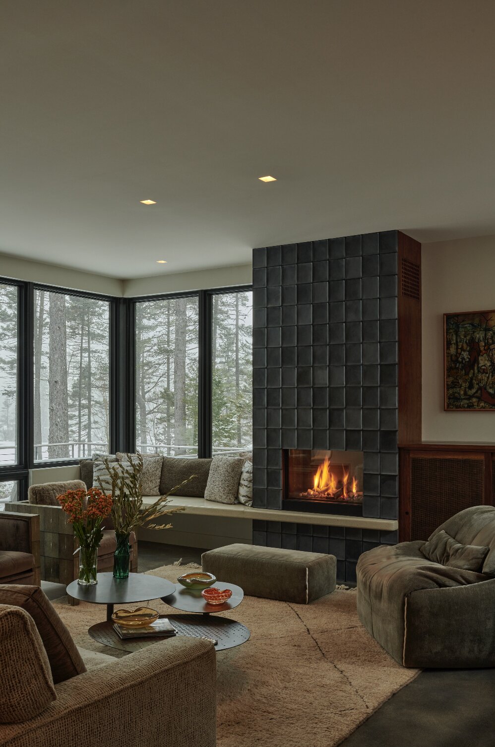 fireplace seating area on Photo 4 Of 12 In A Winding Boardwalk Grounds This Hovering Cabin Along The Edge Of A Remote Pond Dwell