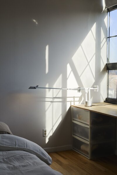 Joshua uses a signed Tizio Lamp by Richard Sapper both for work and relaxation. 