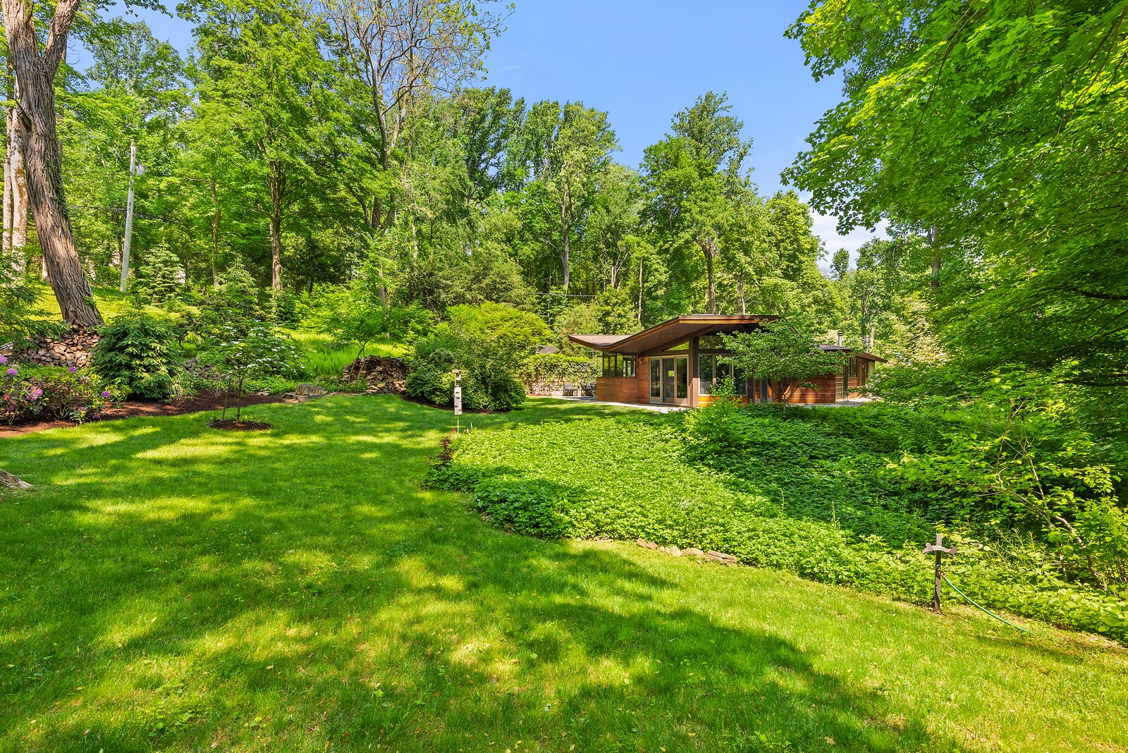 Designed by architect David Henken, the 1951 dwelling sits near the heart of the nationally recognized Usonia Historic District.