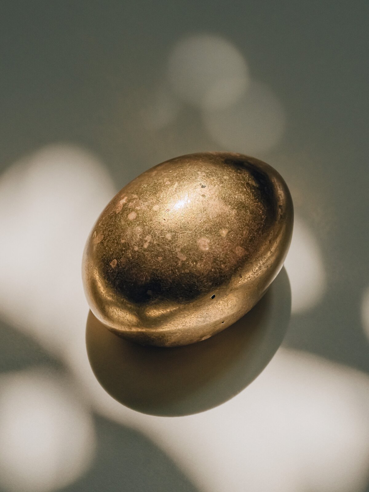 Photo 2 of 2 in A Patinated Brass Egg Harbors the Mystery of Creation ...