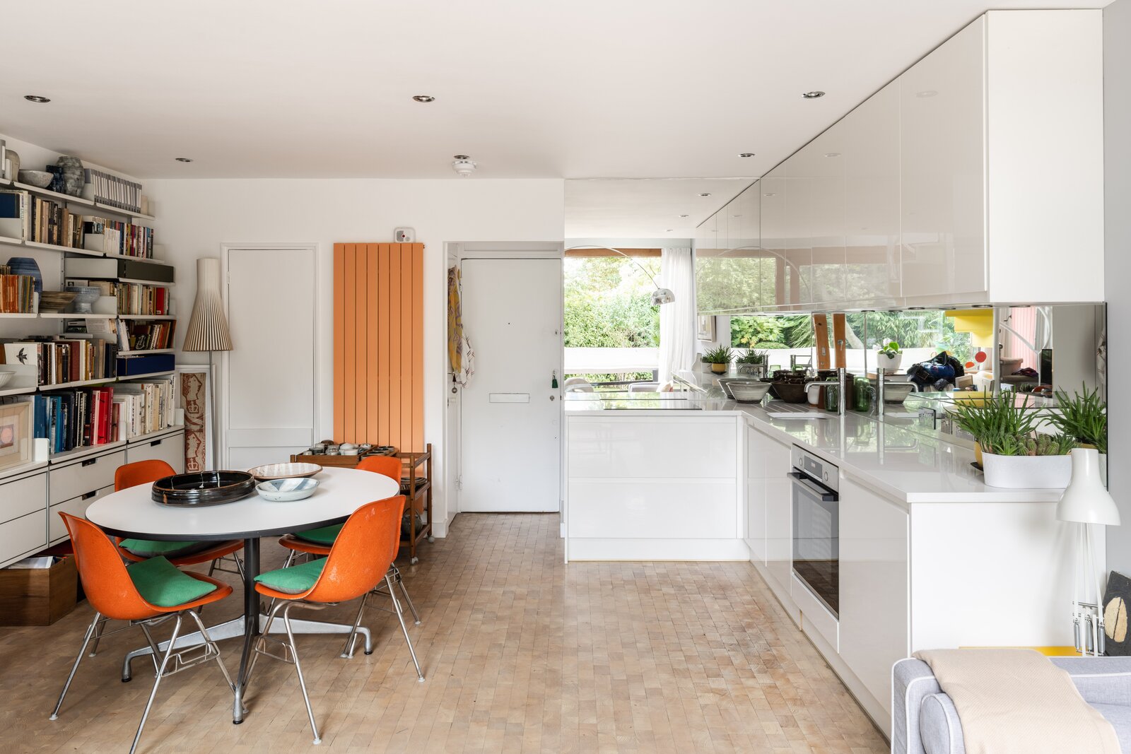 Photo 5 of 10 in A ’60s Studio With a BrightYellow Spiral Staircase