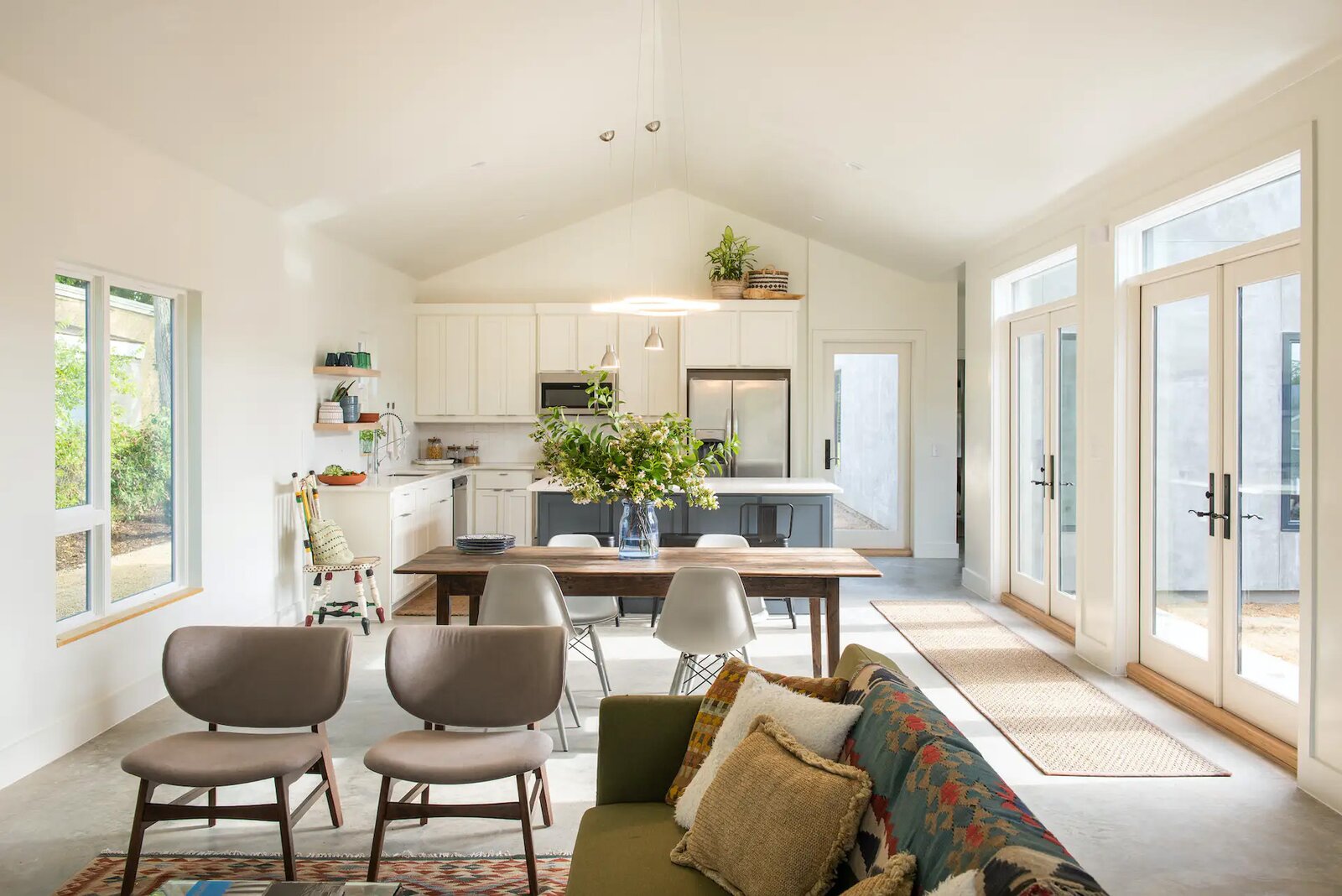 Both models feature the same simple, clean design language with a vaulted ceiling in the main living and dining area that aims to make the relatively small footprint—The Studio is approximately 1250 square feet, and The Standard is approximately 1875 square feet—feel spacious. The modular components can be arranged to create three different layouts, and clients also have the opportunity to choose tiles, paint, and other finishes.