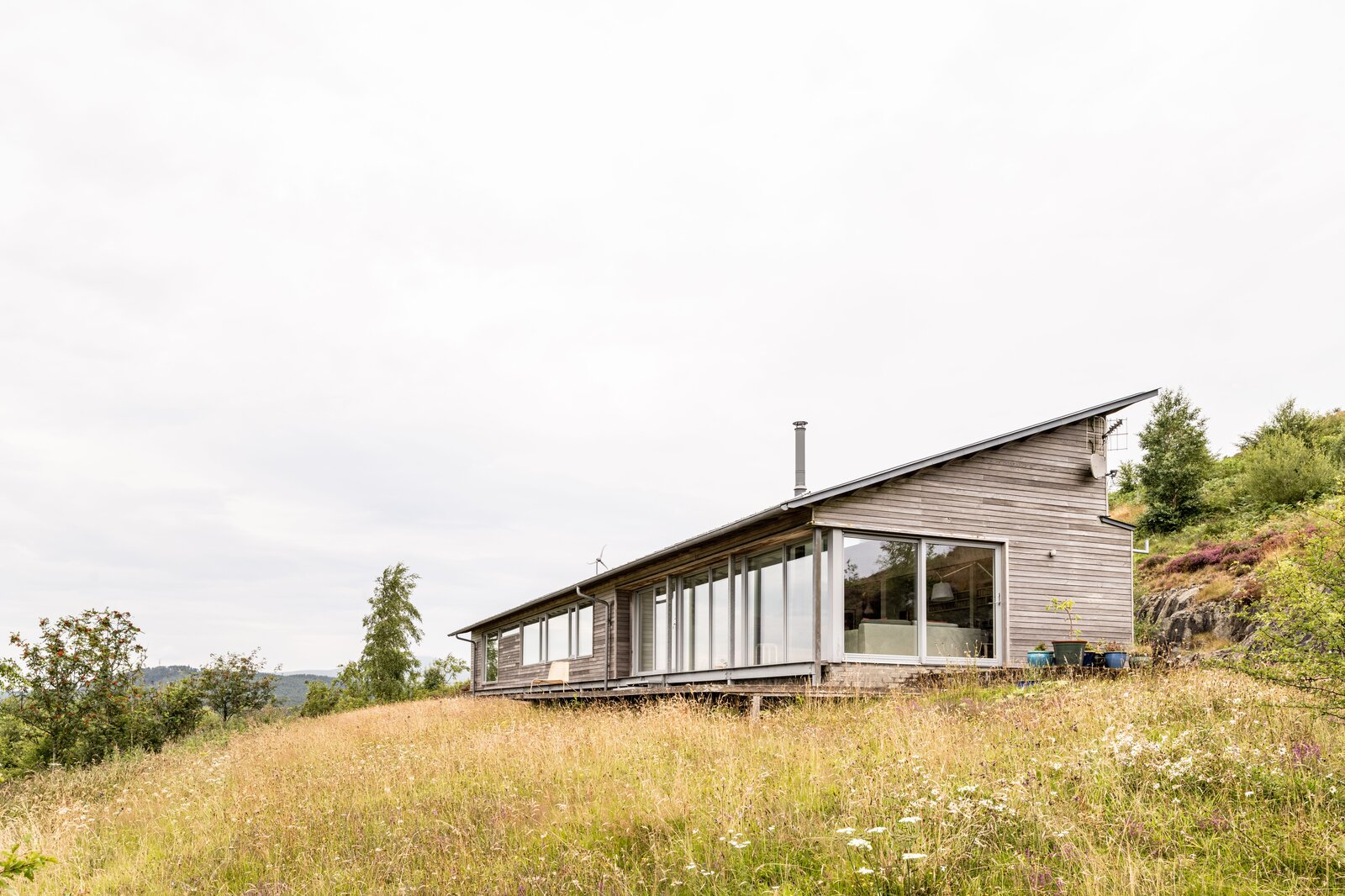 This Secluded, WoodClad Longhouse in Scotland Is Cozy Incarnate Dwell