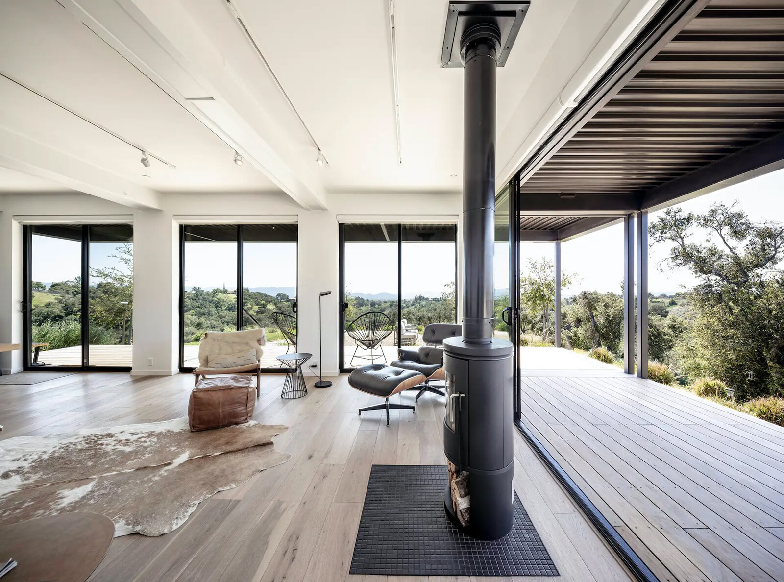 The steel-frame structure allows for floor-to-ceiling triple glazing along the perimeter of the units.