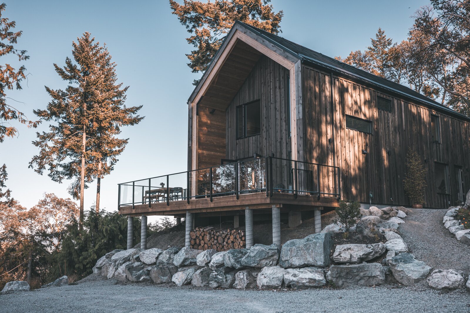 After more than 15 years spent in construction, high school friends Simon Fyall and Richard Egli started to imagine an architecture that blended in with the landscape of British Columbia better than industry-standard buildings. Soon after, the pair founded Blend Projects to build their vision: crisp gabled homes strung together from eight-foot-long cedar-sided glulam sections.