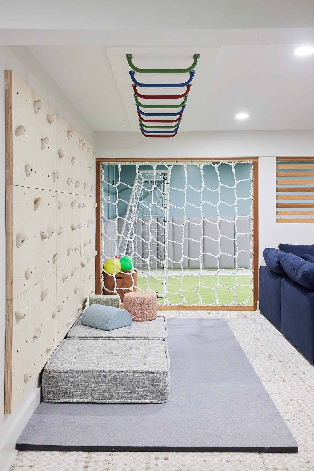 Rock climbing walls and monkey bars are popular features in many custom kids’ playrooms.