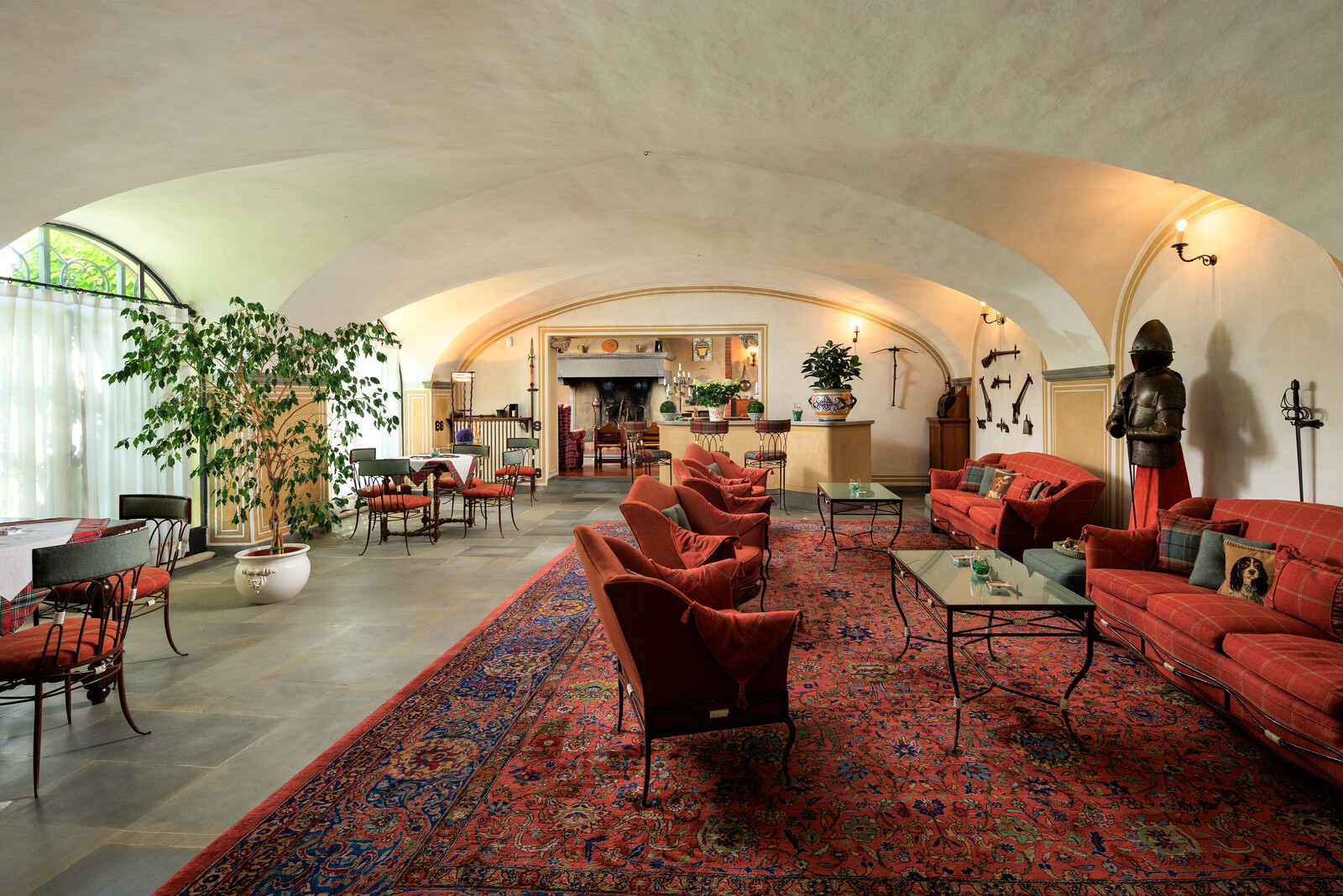 Wide curved archways connect the five entertaining lounges located on the ground level.