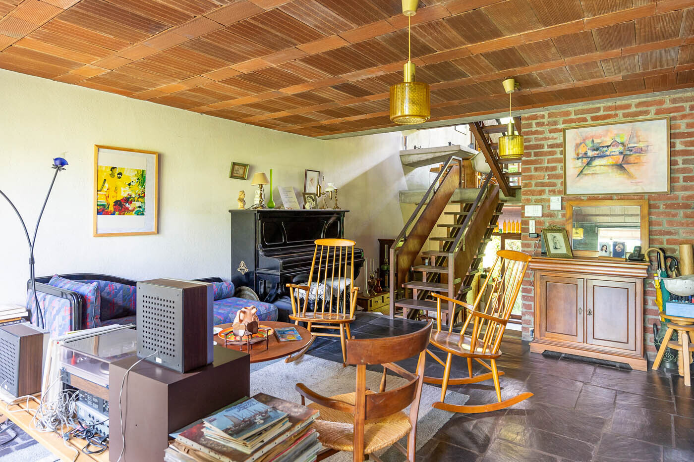 A central staircase connects the living areas dotted throughout the home's five half-levels.
