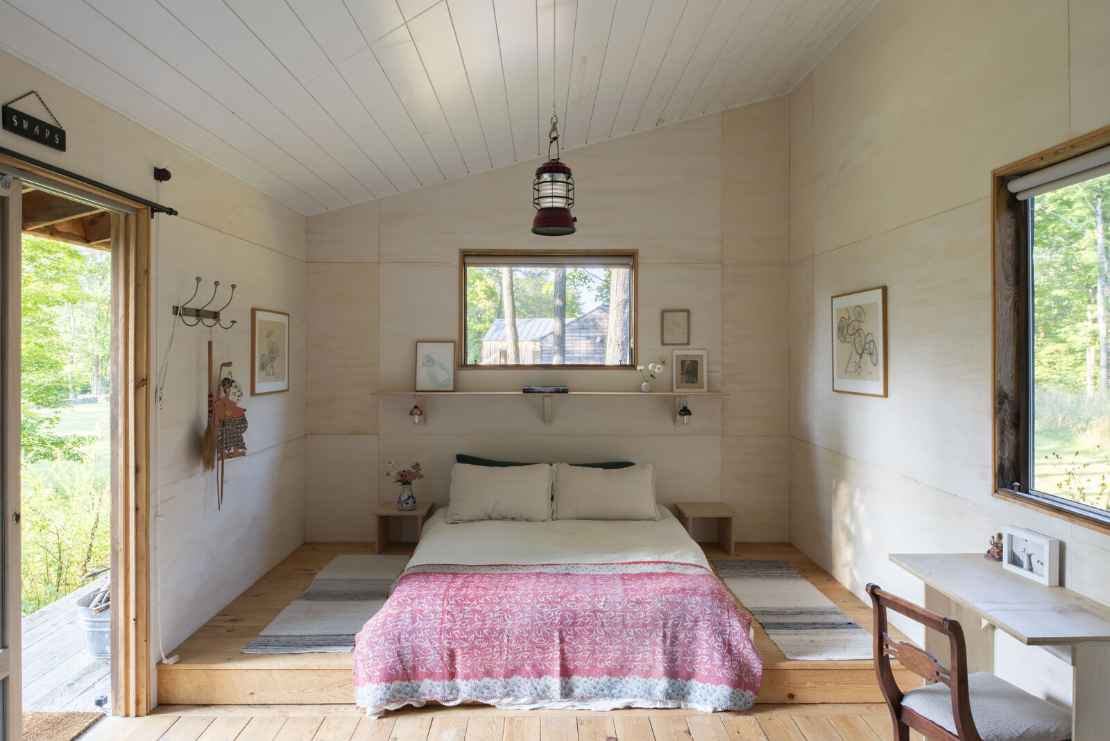 A wildflower meadow connects the main residence with the guest studio, which is also set up to serve as a charming artistic retreat.