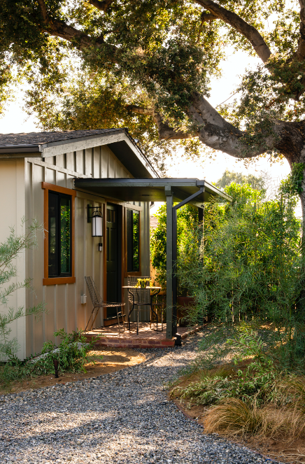 The guest cottages tucked away in the backyard boast similar designs of the main house.
