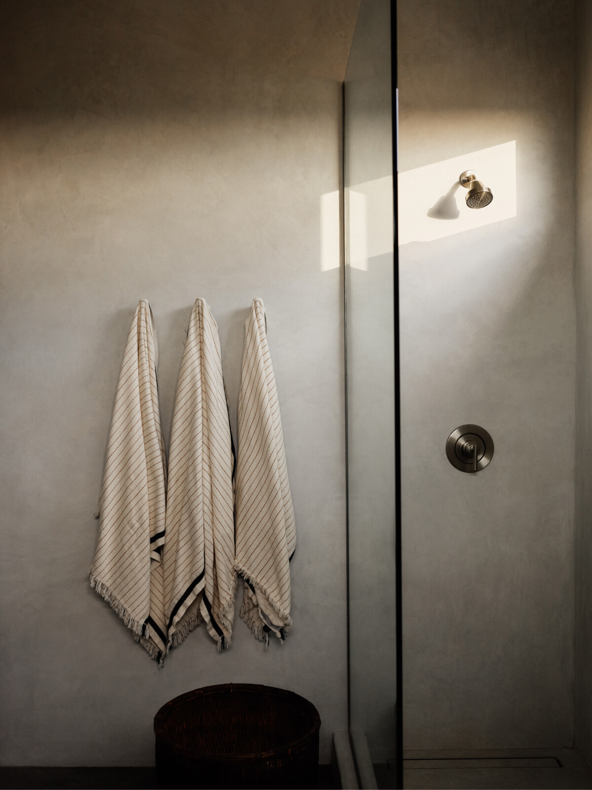 A spa-like bathroom showcases the calm of a neutral palette.