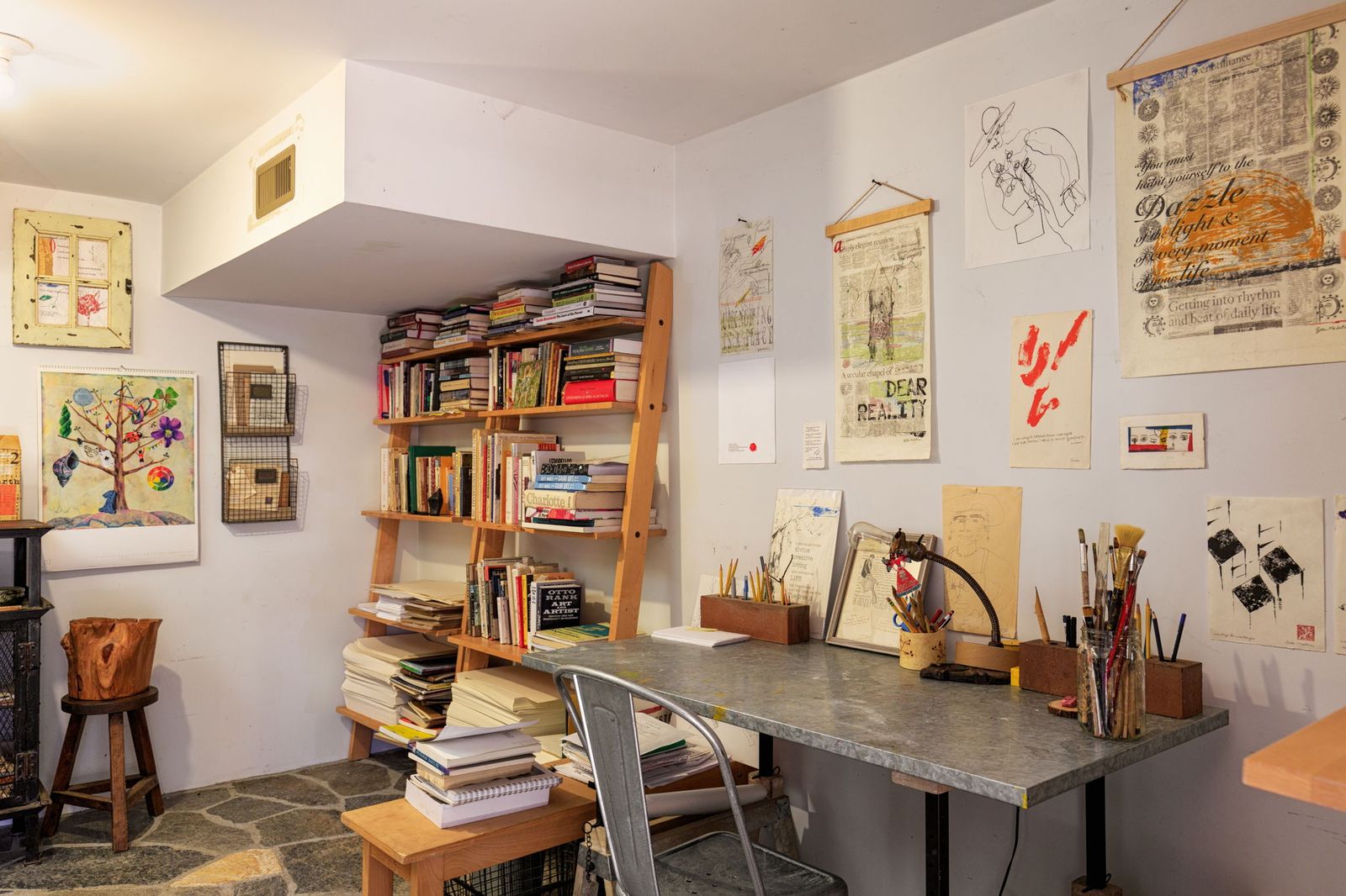 One of the rooms is currently outfitted as an art studio and office space.