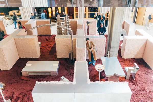 Upon entering the space, we were greeted by a fur-lined maze with an emphasis on metal furniture, all co-curated by Fosbury Architecture. Within it, corners were populated by well-known works like Mario Bellini’s Chiara floor lamp and contemporary counterparts like Studioutte’s Armadillo Low table, both shown above.